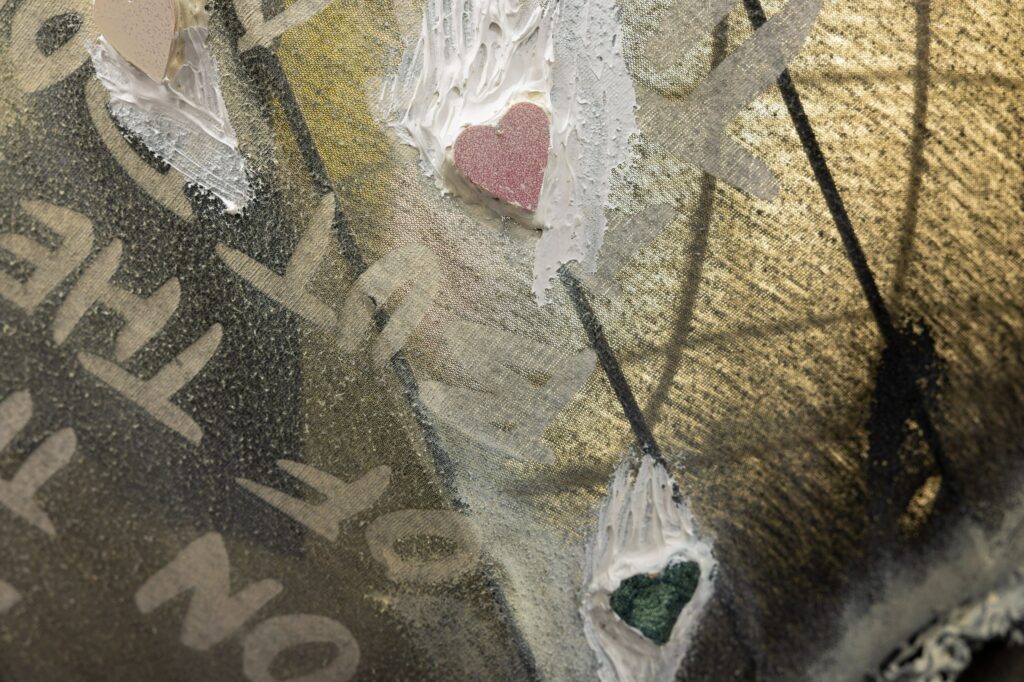 Close-up detail including hearts and text from Set to Self Destruct by Jessi Reaves, 2021.