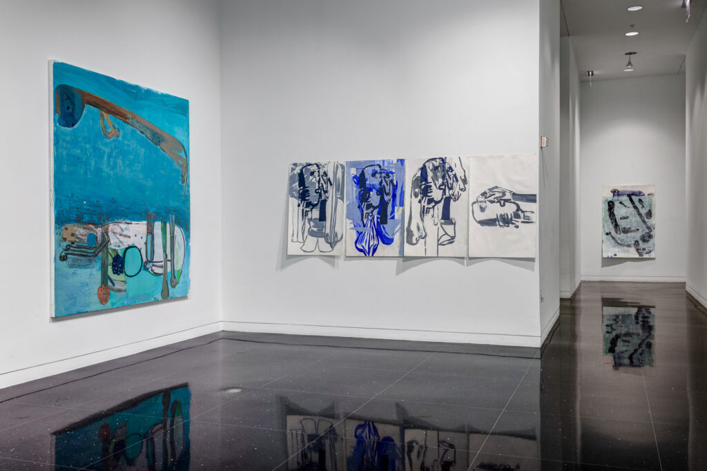 Installation view of The Arts Club's east gallery, where one large blue painting and four mid-sized drawings are installed. A painting down the hall in another room can also be seen.