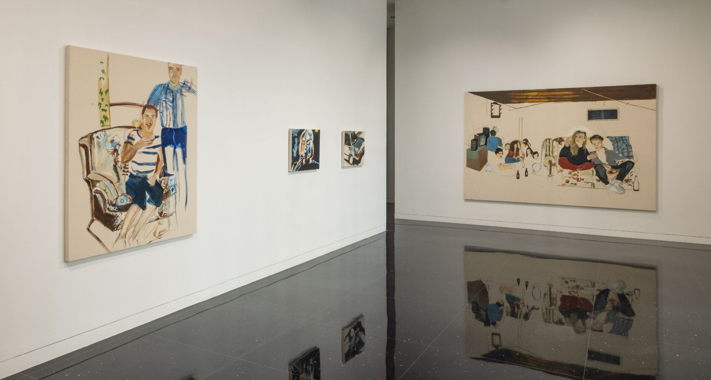 A white-walled gallery corner. On the left wall hang three paintings of varying size. On the right wall hands one large painting of two adults undressed in a bed witnessed by a small girl in a blue nightgown.